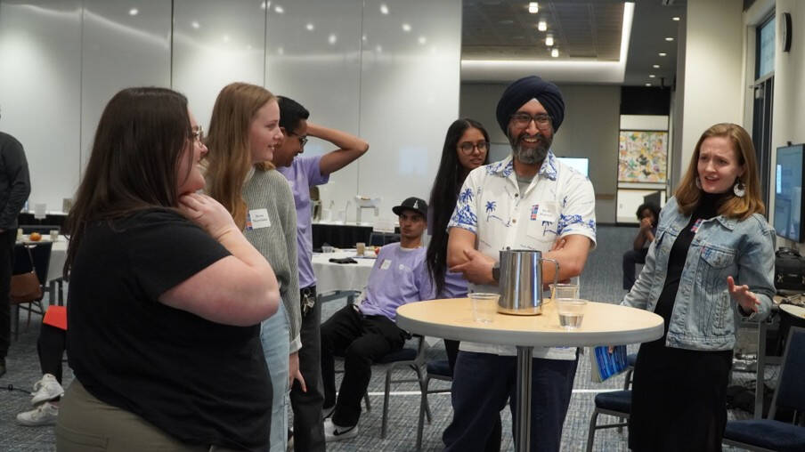 Rishi and others at Scholars mental health event